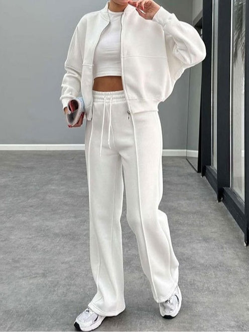 Women's zip-up cardigan and straight leg trousers suit