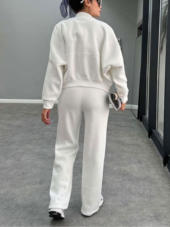 Women's zip-up cardigan and straight leg trousers suit