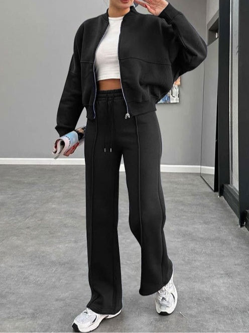 Women's zip-up cardigan and straight leg trousers suit