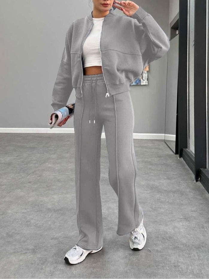 Women's zip-up cardigan and straight leg trousers suit