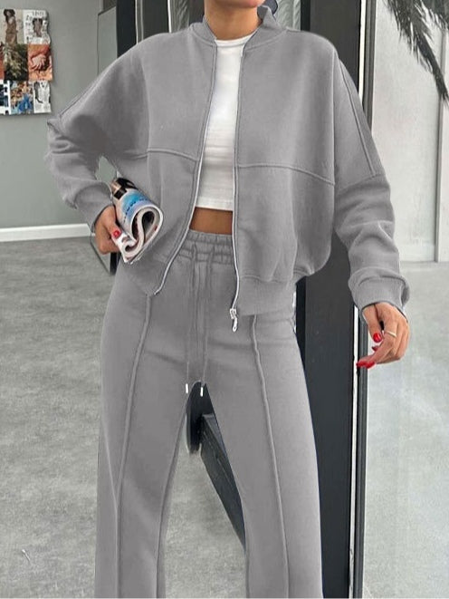 Women's zip-up cardigan and straight leg trousers suit